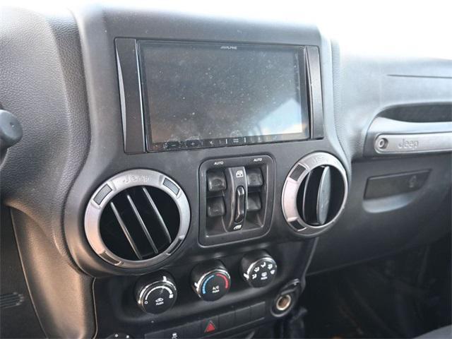 used 2015 Jeep Wrangler Unlimited car, priced at $20,805