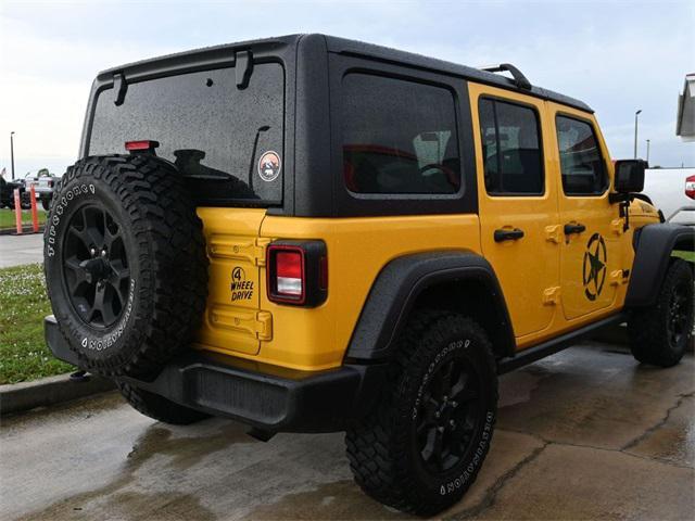 used 2021 Jeep Wrangler Unlimited car, priced at $32,908