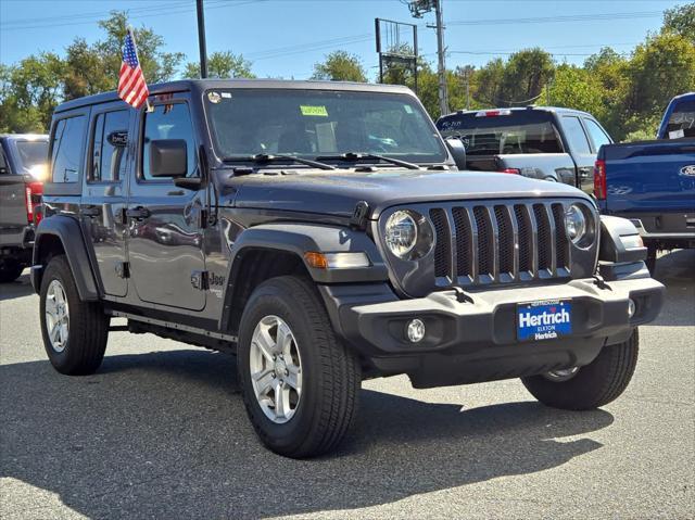 used 2021 Jeep Wrangler Unlimited car, priced at $32,654