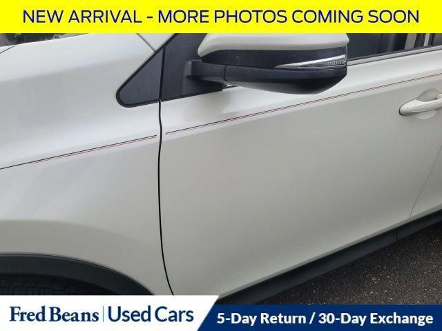 used 2013 Toyota RAV4 car, priced at $13,500