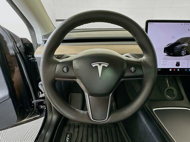 used 2024 Tesla Model Y car, priced at $29,900