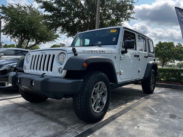 used 2017 Jeep Wrangler Unlimited car, priced at $26,386