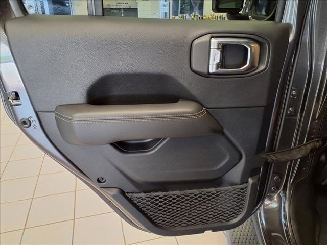 used 2021 Jeep Wrangler Unlimited car, priced at $32,647