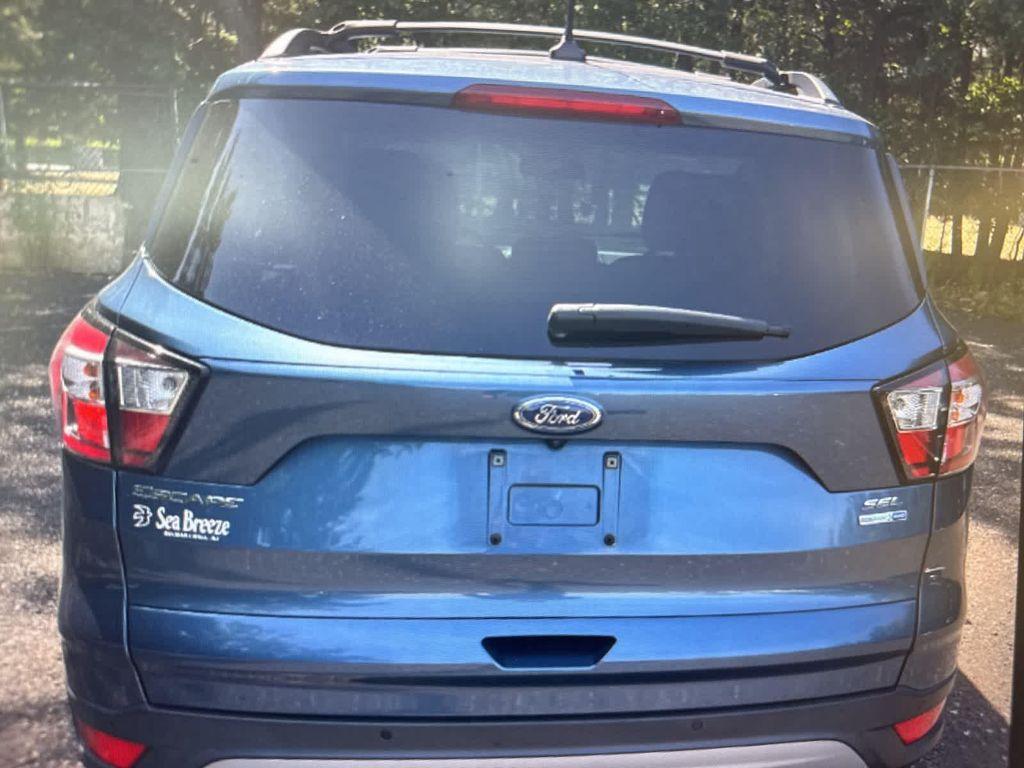 used 2018 Ford Escape car, priced at $12,817