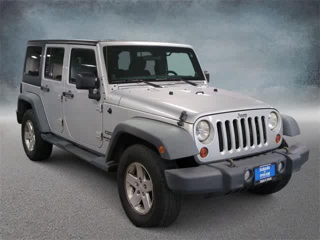 used 2012 Jeep Wrangler Unlimited car, priced at $14,399