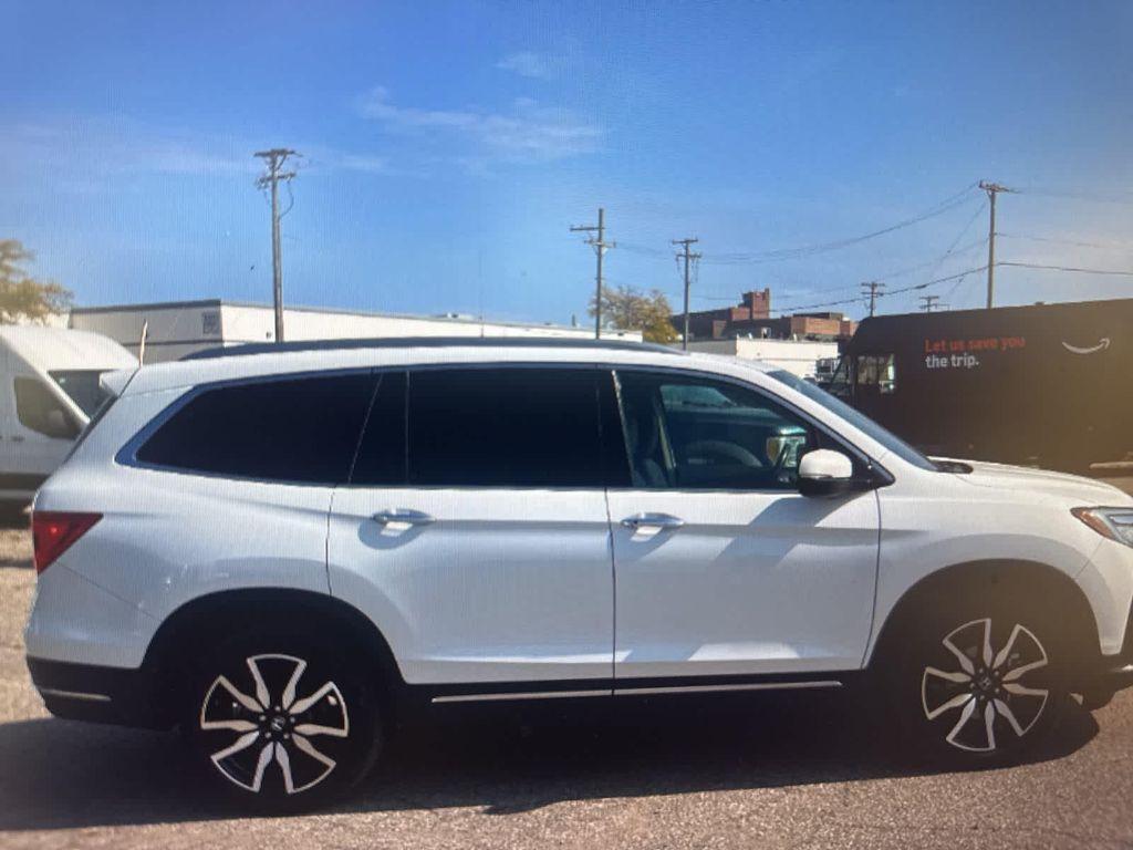 used 2021 Honda Pilot car, priced at $31,495