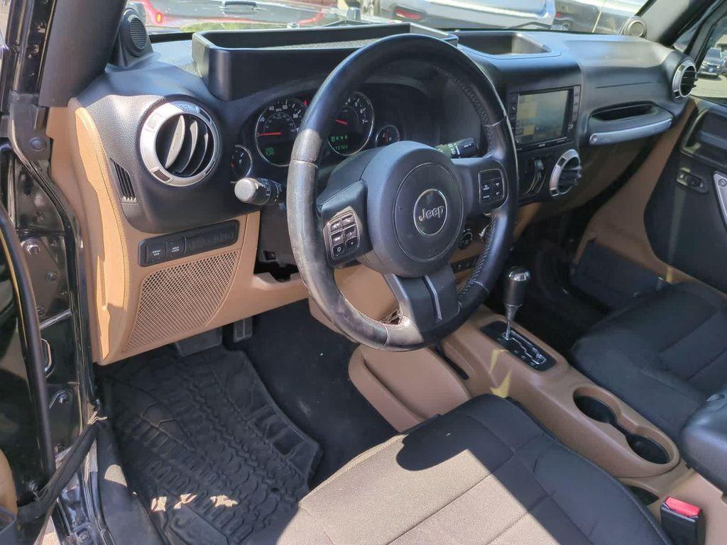 used 2012 Jeep Wrangler Unlimited car, priced at $10,495