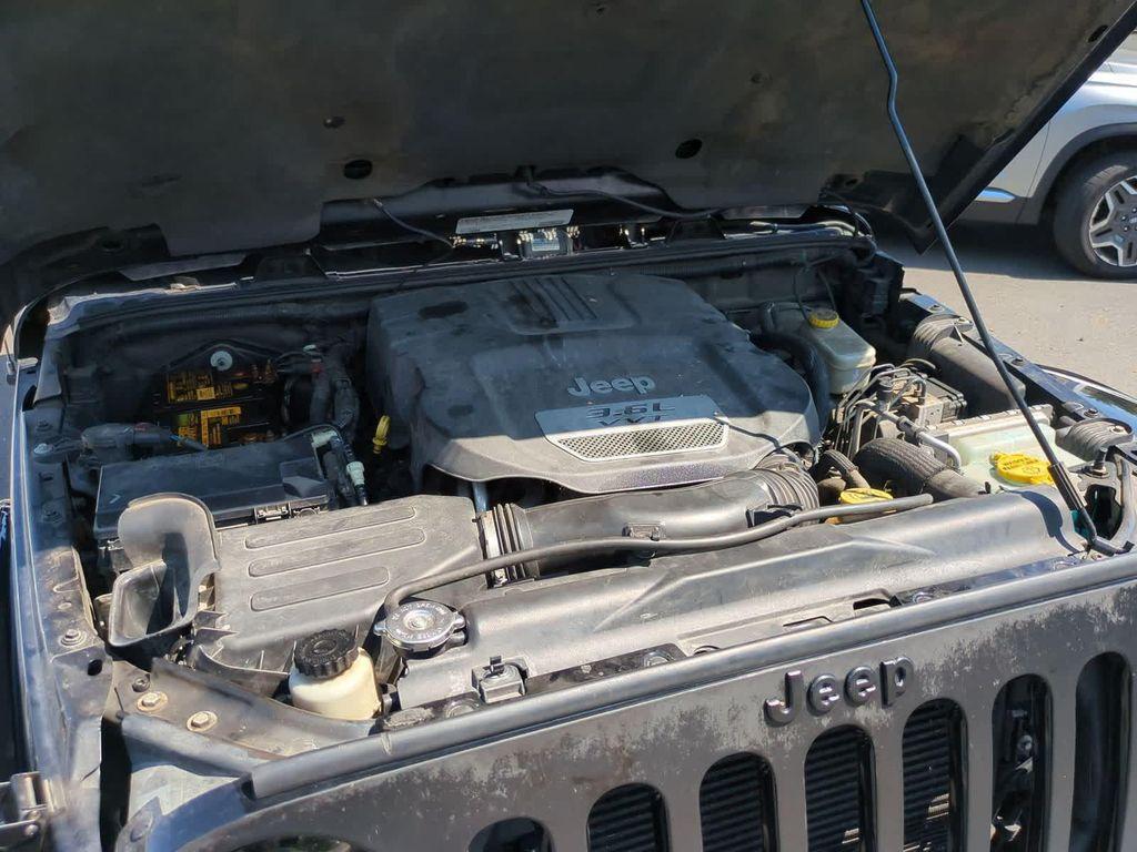 used 2012 Jeep Wrangler Unlimited car, priced at $10,495