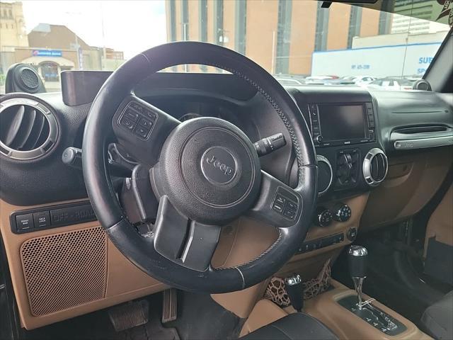 used 2012 Jeep Wrangler Unlimited car, priced at $14,495