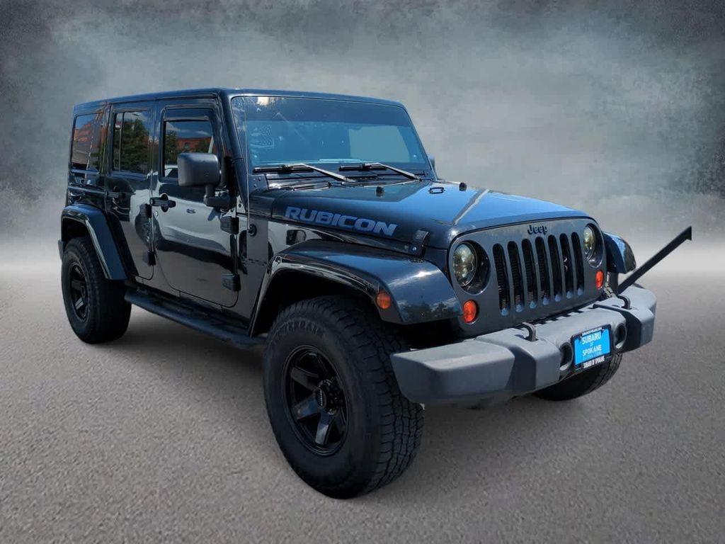 used 2012 Jeep Wrangler Unlimited car, priced at $10,495