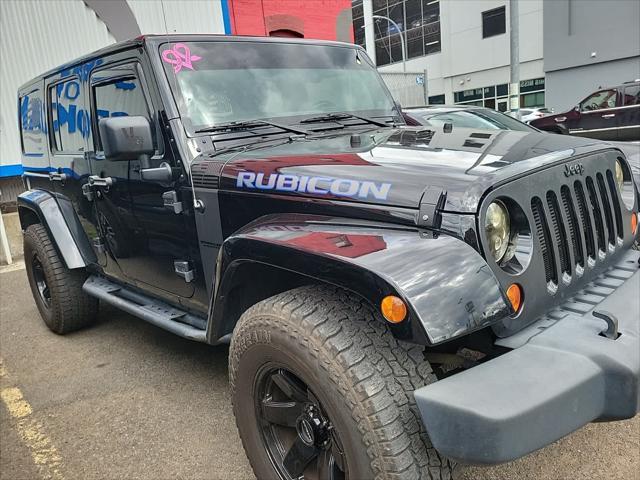 used 2012 Jeep Wrangler Unlimited car, priced at $14,495