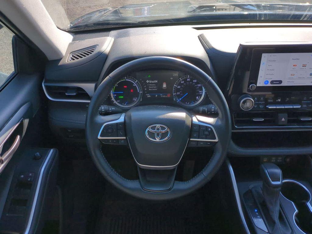 used 2024 Toyota Highlander Hybrid car, priced at $40,448