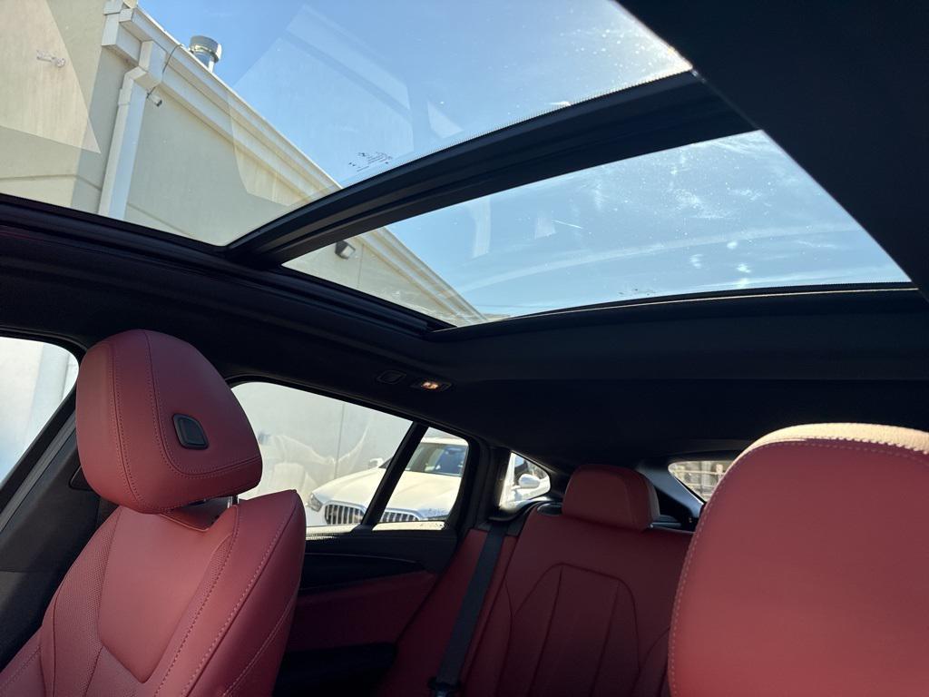 used 2024 BMW X4 car, priced at $60,900