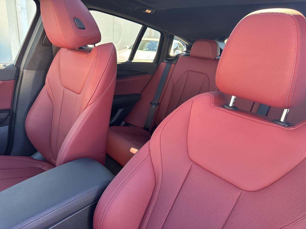 used 2024 BMW X4 car, priced at $60,900