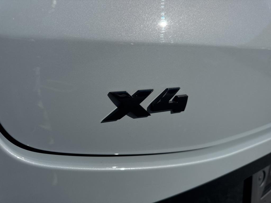 used 2024 BMW X4 car, priced at $60,900