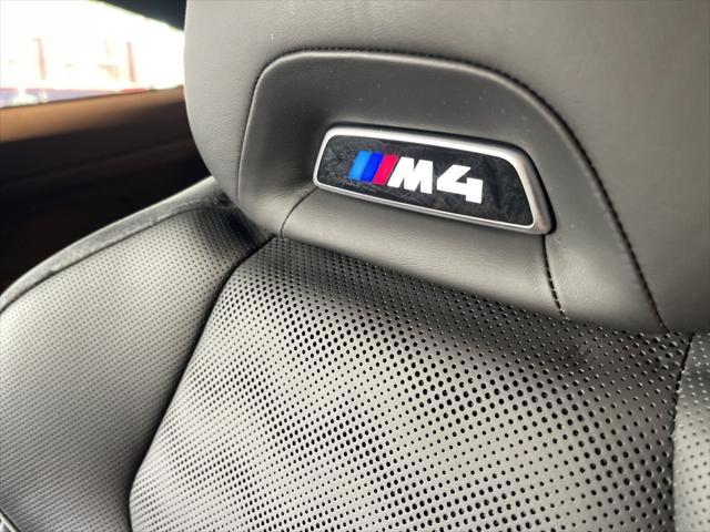 used 2023 BMW M4 car, priced at $73,900