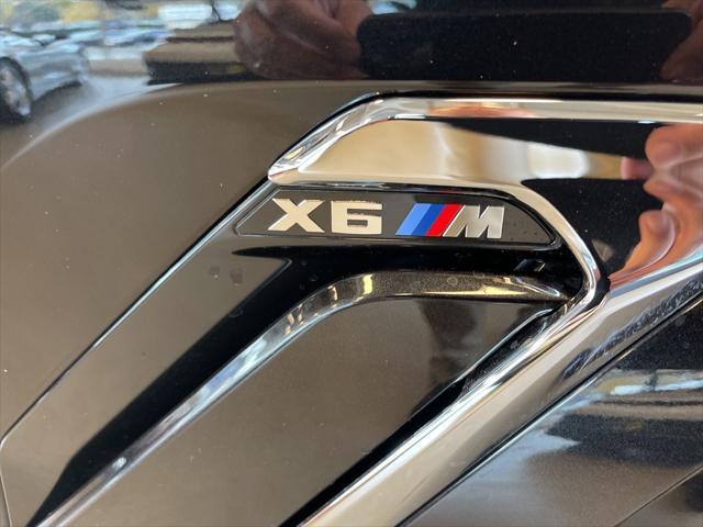 used 2023 BMW X6 M car, priced at $91,900