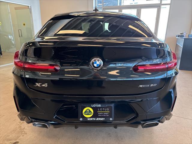 used 2022 BMW X4 car, priced at $41,500