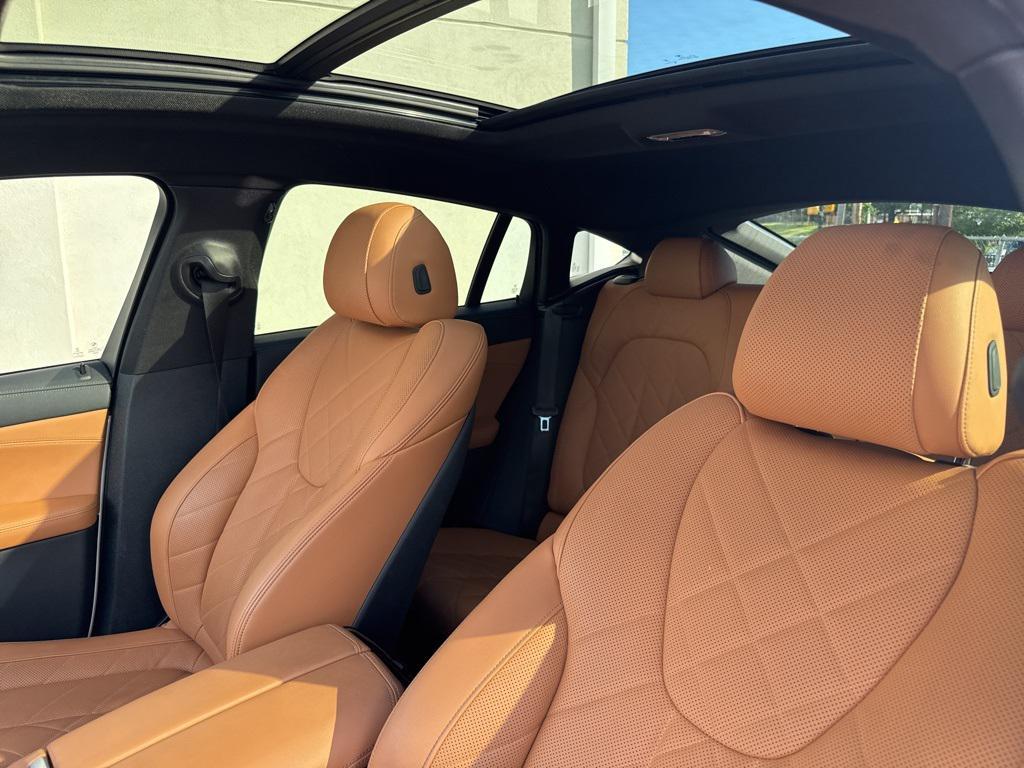 used 2023 BMW X6 car, priced at $58,900