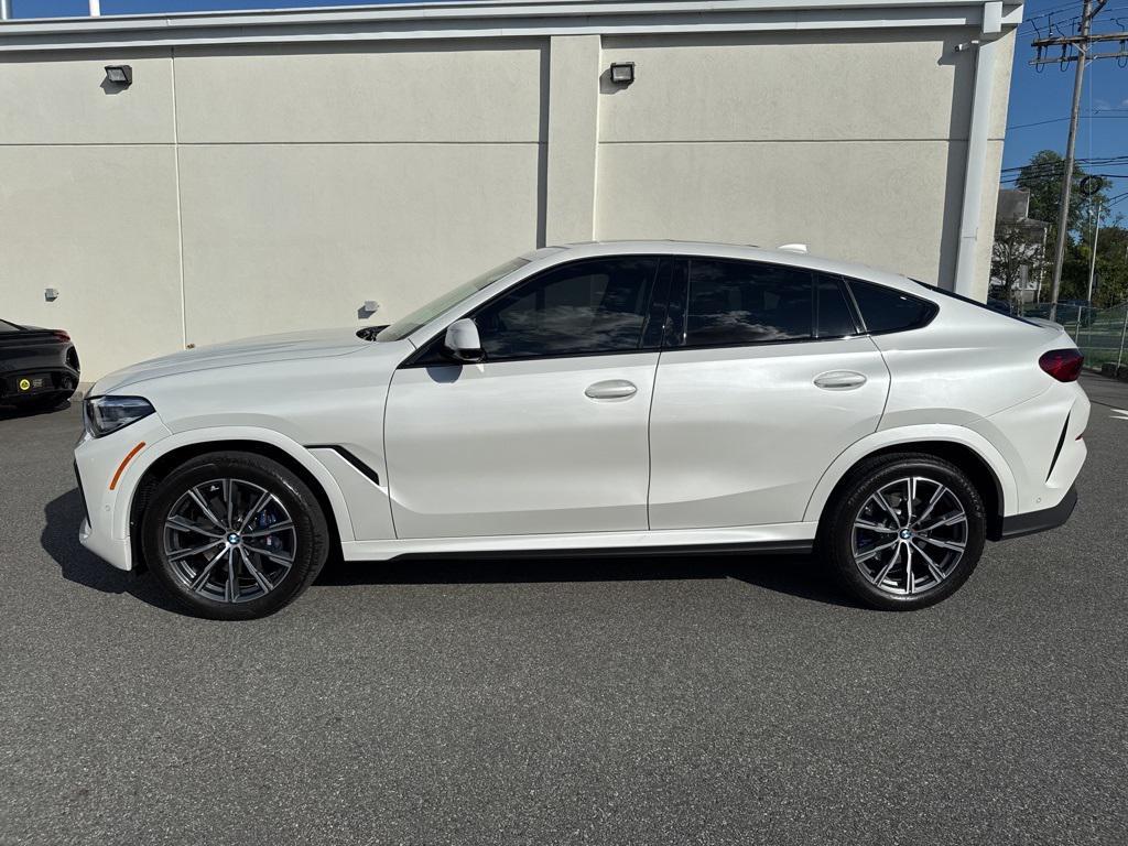 used 2023 BMW X6 car, priced at $58,900