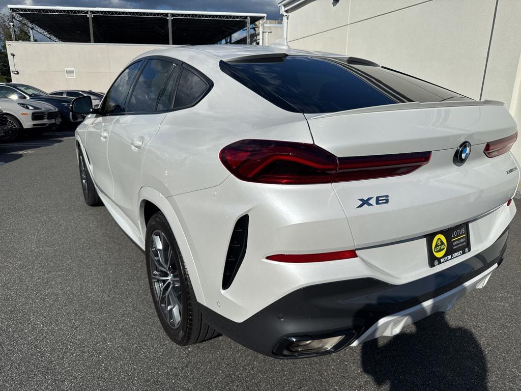 used 2023 BMW X6 car, priced at $58,900