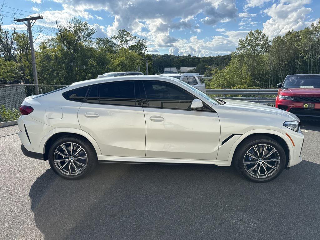 used 2023 BMW X6 car, priced at $58,900