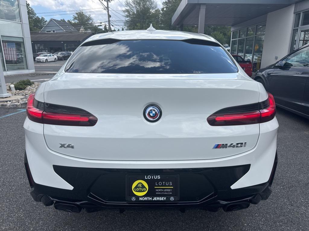 used 2023 BMW X4 car, priced at $52,900