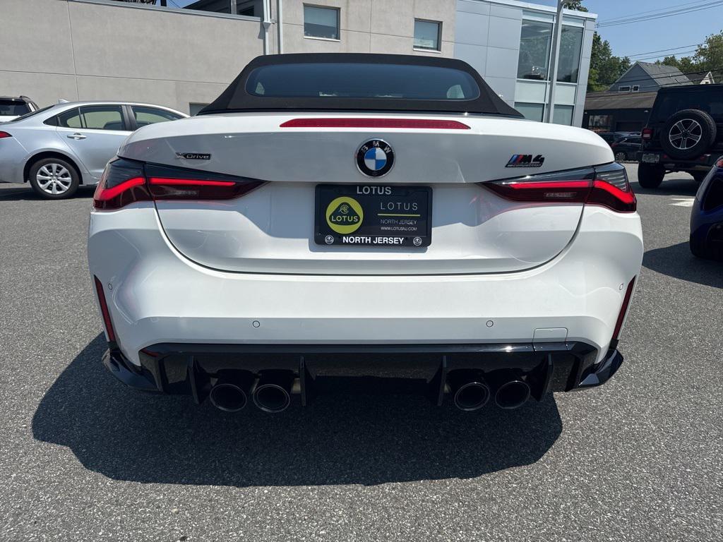 used 2024 BMW M4 car, priced at $79,900