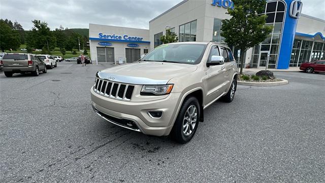 used 2014 Jeep Grand Cherokee car, priced at $17,570