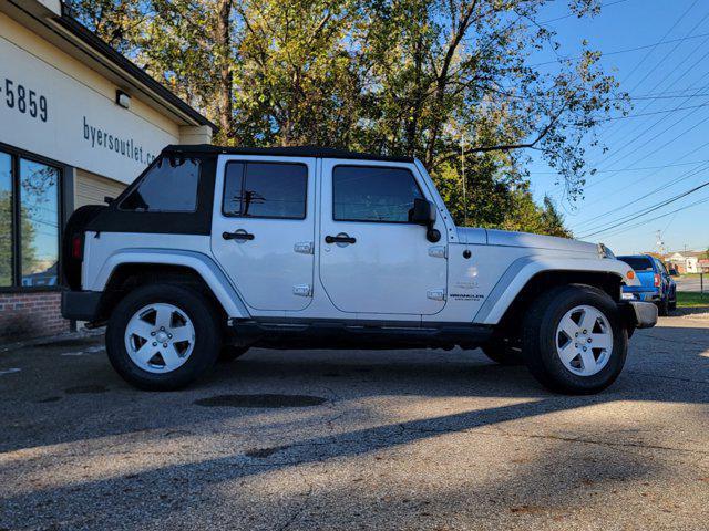 used 2010 Jeep Wrangler Unlimited car, priced at $10,999