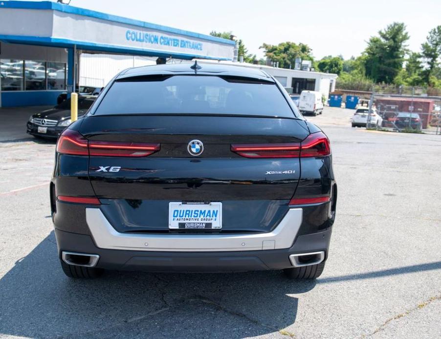 used 2023 BMW X6 car, priced at $56,436