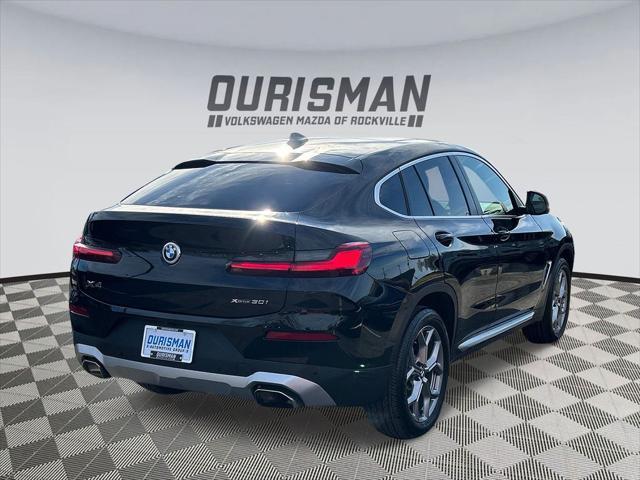 used 2023 BMW X4 car, priced at $45,400