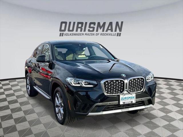 used 2023 BMW X4 car, priced at $45,400