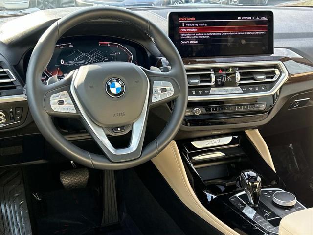 used 2023 BMW X4 car, priced at $45,400