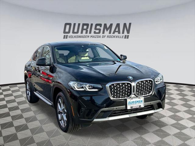 used 2023 BMW X4 car, priced at $45,400