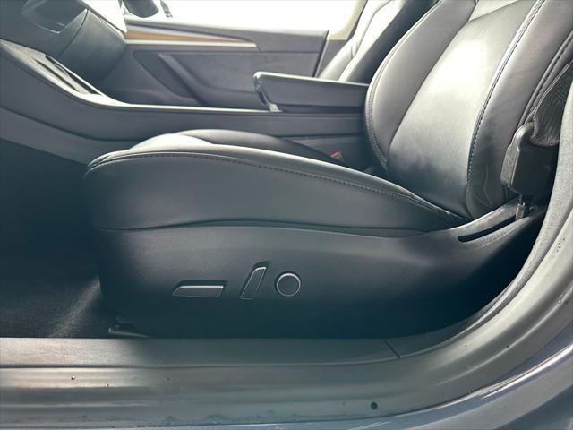 used 2023 Tesla Model 3 car, priced at $23,500