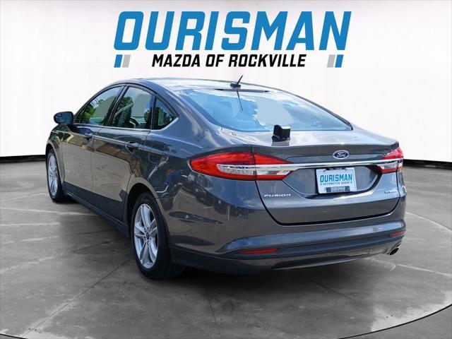 used 2018 Ford Fusion Hybrid car, priced at $16,000