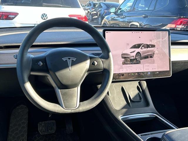 used 2023 Tesla Model Y car, priced at $31,000