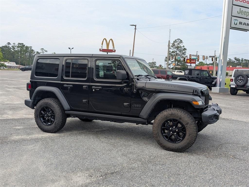 used 2021 Jeep Wrangler Unlimited car, priced at $31,282