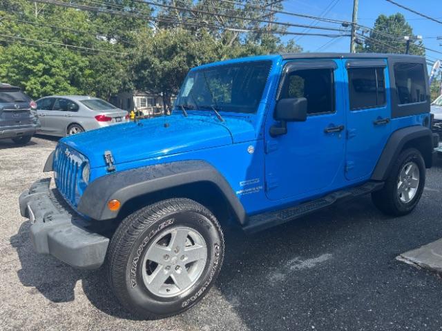 used 2011 Jeep Wrangler Unlimited car, priced at $10,997