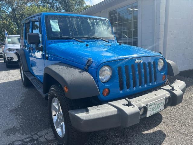 used 2011 Jeep Wrangler Unlimited car, priced at $10,997
