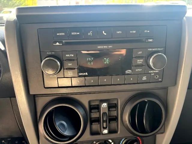 used 2010 Jeep Wrangler Unlimited car, priced at $15,997