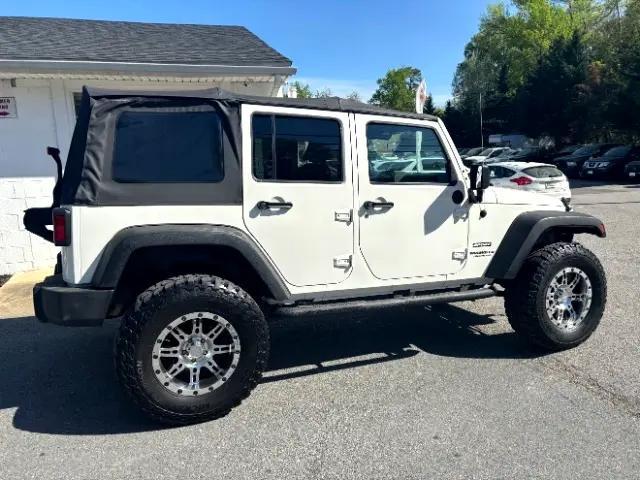 used 2010 Jeep Wrangler Unlimited car, priced at $15,997