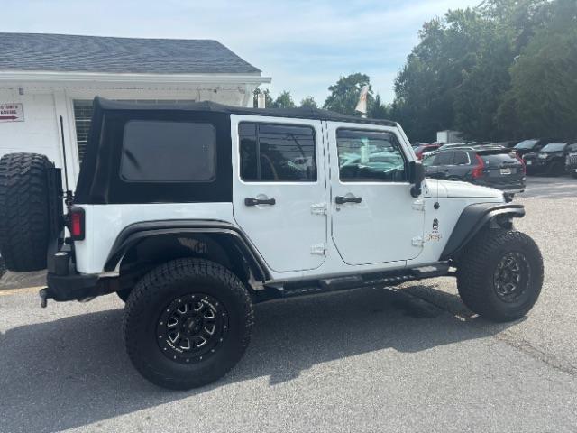 used 2014 Jeep Wrangler Unlimited car, priced at $16,700