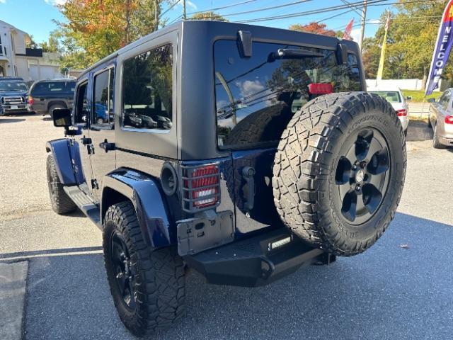 used 2013 Jeep Wrangler Unlimited car, priced at $17,497