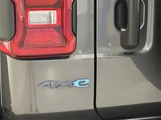 used 2022 Jeep Wrangler Unlimited 4xe car, priced at $34,198