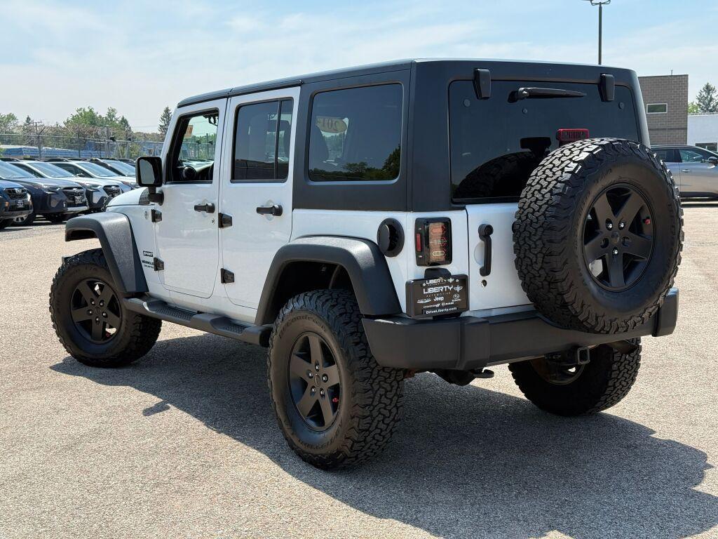 used 2014 Jeep Wrangler Unlimited car, priced at $16,557