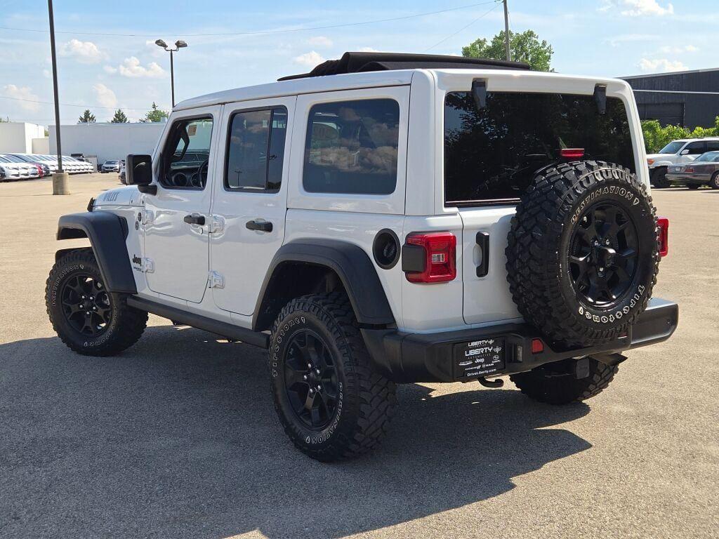used 2021 Jeep Wrangler Unlimited car, priced at $30,812