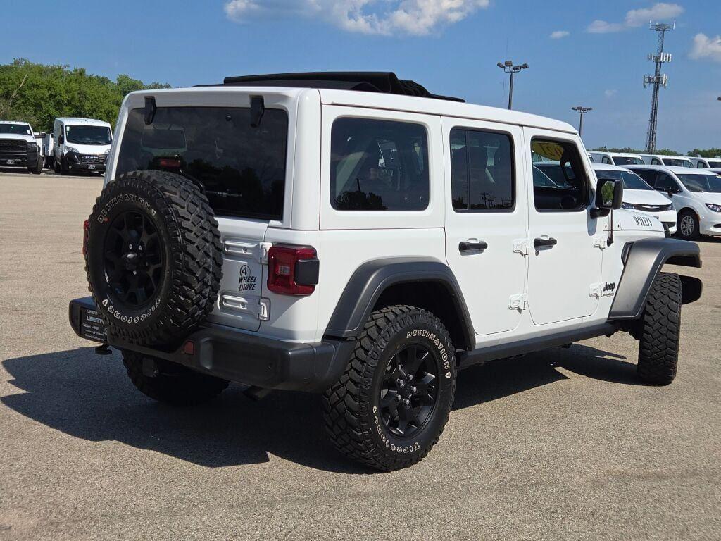 used 2021 Jeep Wrangler Unlimited car, priced at $30,812