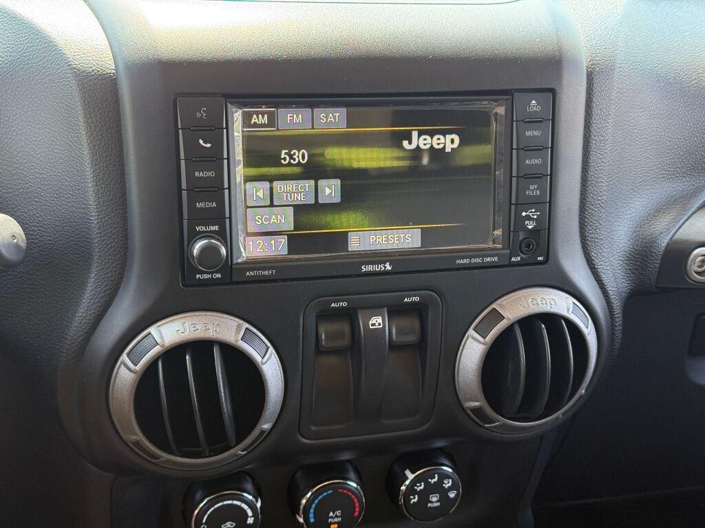used 2016 Jeep Wrangler car, priced at $19,893